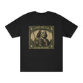 Fishing T-shirt with "Savage Reel Club: In Fish We Trust" slogan featuring Benjamin Franklin graphic, casual wear for anglers.