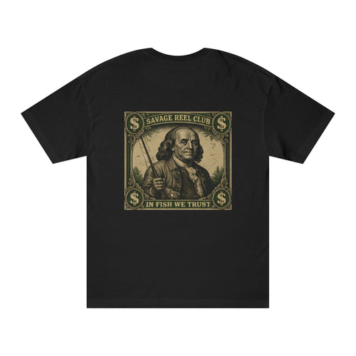 Fishing T-shirt with "Savage Reel Club: In Fish We Trust" slogan featuring Benjamin Franklin graphic, casual wear for anglers.